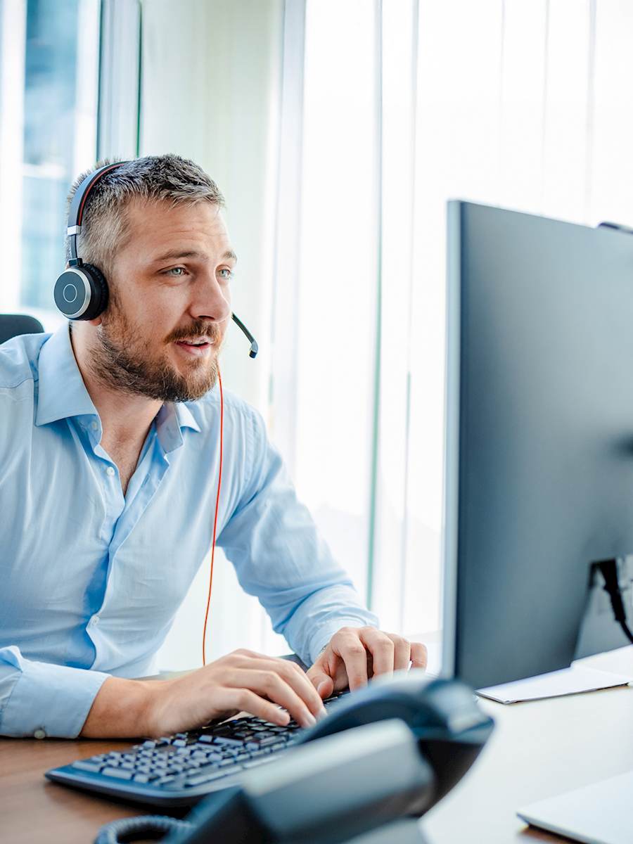 man on computer